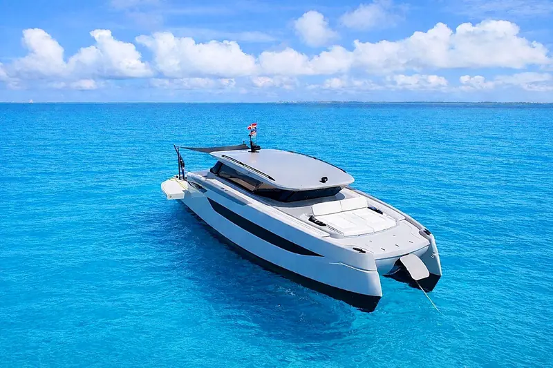 Sunreef Ultima 55 at anchor in turquoise water